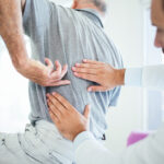 Back pain Doctor Analysing the back pain problem of patient