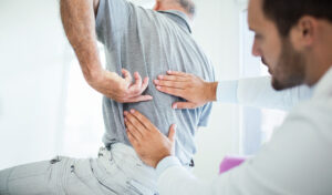 Back pain Doctor Analysing the back pain problem of patient