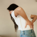 Kidney infection pyelonephritis urinary tract infection. Attractive woman feel backache spine pain because of UTI pyelonephritis disease