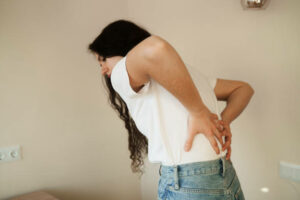 Kidney infection pyelonephritis urinary tract infection. Attractive woman feel backache spine pain because of UTI pyelonephritis disease